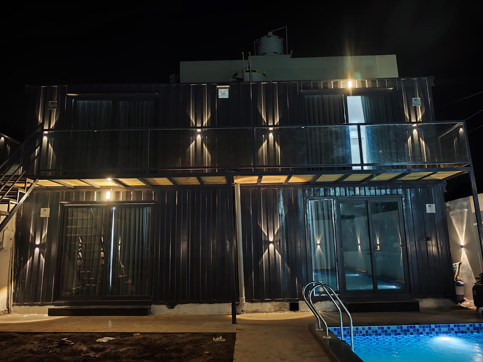 Velora Villa Udaipur — villa exterior, container-style architecture